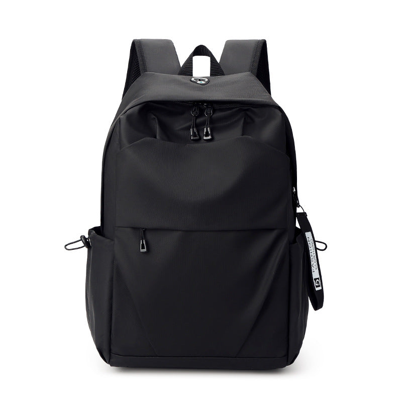 Simple and casual Oxford cloth backpack, large capacity laptop bag for commuting.