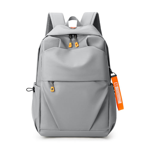 Simple and casual Oxford cloth backpack, large capacity laptop bag for commuting.